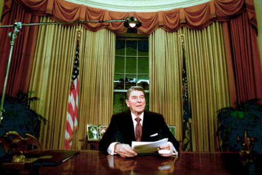FILE - President Ronald Reagan sits in the Oval Office after he delivered his farewell address to the nation Jan. 11, 1989, from the Oval Office of the White House in Washington. The age question for presidential candidates is more than four decades old.