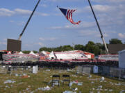 A campaign rally site for Republican presidential candidate former President Donald Trump is empty and littered with debris Saturday, July 13, 2024, in Butler, Pa.