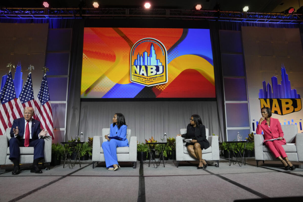 Republican presidential candidate former President Donald Trump, left, moderated by from left, ABC&#039;s Rachel Scott, Semafor&#039;s Nadia Goba and FOX News&#039; Harris Faulkner, speaks at the National Association of Black Journalists, NABJ, convention, Wednesday, July 31, 2024, in Chicago.