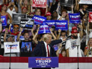 Republican presidential candidate former President Donald Trump points at supporters at a campaign rally in Charlotte, N.C., Wednesday, July 24, 2024.