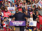Republican presidential candidate former President Donald Trump addresses the crowd at a campaign event in Butler, Pa., on Saturday, July 13, 2024. (AP Photo/Gene J.