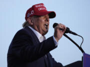 FILE - Republican presidential candidate former President Donald Trump speaks at a campaign rally, July 9, 2024, in Doral, Fla. Trump waiting until the actual convention to choose a running mate is later than usual for recent cycles, but hardly unprecedented.