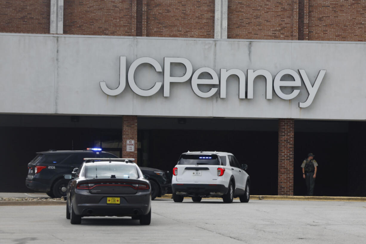 Emergency vehicles are shown at a mall in Davenport, Iowa after gunshots sent people running Monday, July 22, 2024.