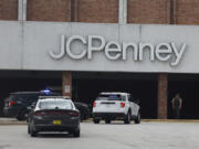 Emergency vehicles are shown at a mall in Davenport, Iowa after gunshots sent people running Monday, July 22, 2024.