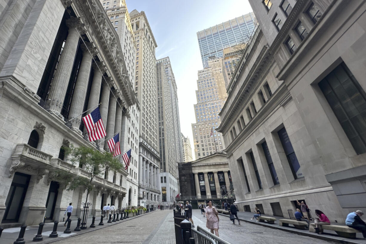 The New York Stock Exchange, left, is shown on Wednesday, July 10, 2024, in New York.