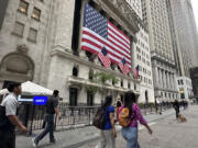 FILE - The New York Stock Exchange is shown on July 17, 2024, in New York. Global shares are mostly lower on Thursday, July 18, 2024, with Tokyo&rsquo;s benchmark dipping more than 2%, after Wall Street&rsquo;s record-breaking rally slammed into a wall of worries over potentially worsening trade tensions with China.