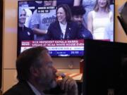 A television on the floor of the New York Stock Exchange shows U.S. Vice President Kamala Harris speaking at the White House, Monday, July 22, 2024.