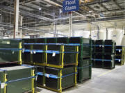 Stacks of glass panes are shown during a grand opening tour of the Fuyao Glass America plant, Friday, Oct. 7, 2016, in Moraine, Ohio. The Chinese automotive glass maker said the company was not the target of a federal investigation that last week temporarily shut down production at its Ohio plant, which was the subject of the Netflix film &ldquo;American Factory&rdquo; that won an Oscar in 2020.   Fuyao Glass America said it was told by authorities that a third party employment company was at the center of the criminal investigation, according to a filing with the Shanghai Stock Exchange.