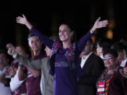 FILE - Future President Claudia Sheinbaum waves to supporters at the Zocalo, Mexico City&rsquo;s main square, after the National Electoral Institute announced she held an irreversible lead in the election, early Monday, June 3, 2024.