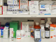 FILE - Temperature and humidity are monitored in a medicine cabinet at a medical center in California on Wednesday, May 29, 2024. Extreme heat can raise the danger of heat-related illnesses and threaten health in a more subtle way &mdash; by amplifying the side effects of many common medications. Hot weather, too, can damage medicines such as insulin that require refrigeration. Inhalers can explode. Epinephrine injectors such as EpiPens can malfunction. Meds delivered in the mail can deteriorate.