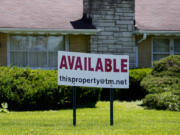 FILE - A sign announcing the availability of a home is displayed in Rolling Meadows, Ill., June 10, 2024. On Tuesday, July 23, 2024, the National Association of Realtors reports on existing home sales for June. (AP Photo/Nam Y.