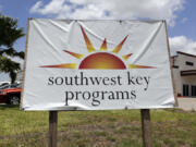 FILE - A Southwest Key Programs sign is displayed on June 20, 2014, in Brownsville, Texas. Southwest Key, the largest housing provider for unaccompanied migrant children has been accused of &ldquo;severe, pervasive, and unwelcome sexual abuse of and harassment&rdquo; of children in its care, the Justice Department said Thursday, July 18, 2024.