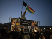 Photos of the children and teens killed in a rocket strike at a soccer field, are displayed at a roundabout as people light candles in their memories, at the village of Majdal Shams, in the Israeli-annexed Golan Heights, Sunday, July 28, 2024. A rocket strike at a soccer field in the village has killed at least 12 children and teens. It&#039;s the deadliest strike on an Israeli target along the country&#039;s northern border since the fighting between Israel and the Lebanese militant group Hezbollah began.