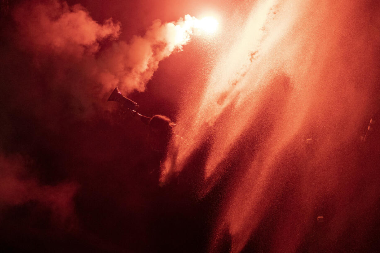 Police use water cannon to disperse demonstrators during a protest against Israeli Prime Minister Benjamin Netanyahu&rsquo;s government, and calling for the release of hostages held in the Gaza Strip by the Hamas militant group, in Tel Aviv, Israel, Saturday, July 6, 2024.