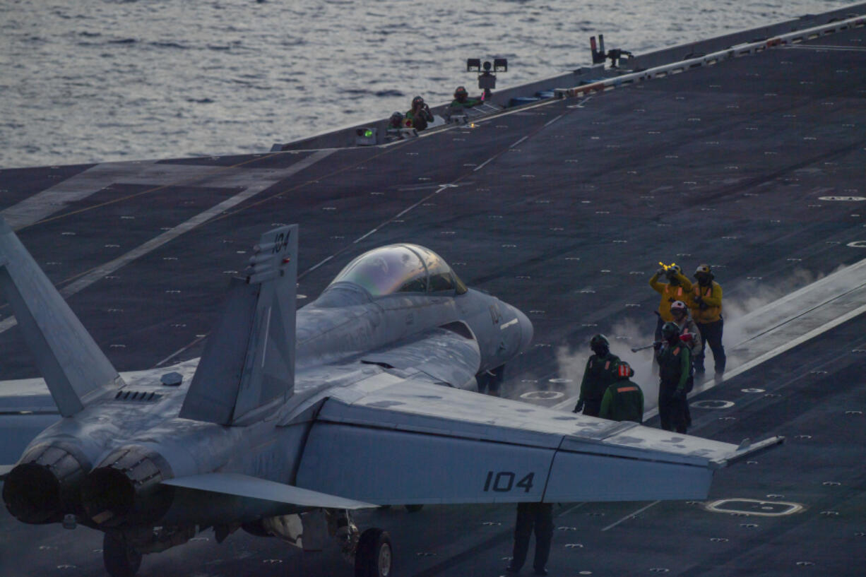 In this photograph released by the U.S. Navy, an F/A-18 Super Hornet prepares to launch off the flight deck of the Nimitz-class aircraft carrier USS Theodore Roosevelt on July 5, 2024, in the South China Sea. The Roosevelt is replacing the USS Dwight D. Eisenhower in the Navy&rsquo;s campaign against attacks by Yemen&rsquo;s Houthi rebels targeting shipping in the Red Sea corridor over the Israel-Hamas war in the Gaza Strip. (Seaman Aaron Haro Gonzalez/U.S.