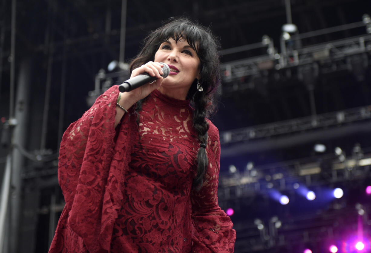 FILE -Ann Wilson, of Heart, performs at RFK Stadium in Washington on July 4, 2015. Wilson says she has cancer. The band is postponing the remaining shows on its Royal Flush Tour.