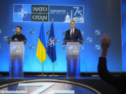 Ukraine&#039;s President Volodymyr Zelenskyy and NATO Secretary General Jens Stoltenberg speak during a press conference the NATO summit in Washington, Thursday, July 11, 2024.