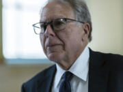 FILE - Wayne LaPierre, former CEO of the National Rifle Association walks in the hallway at civil court in New York, Monday, July 15, 2024.