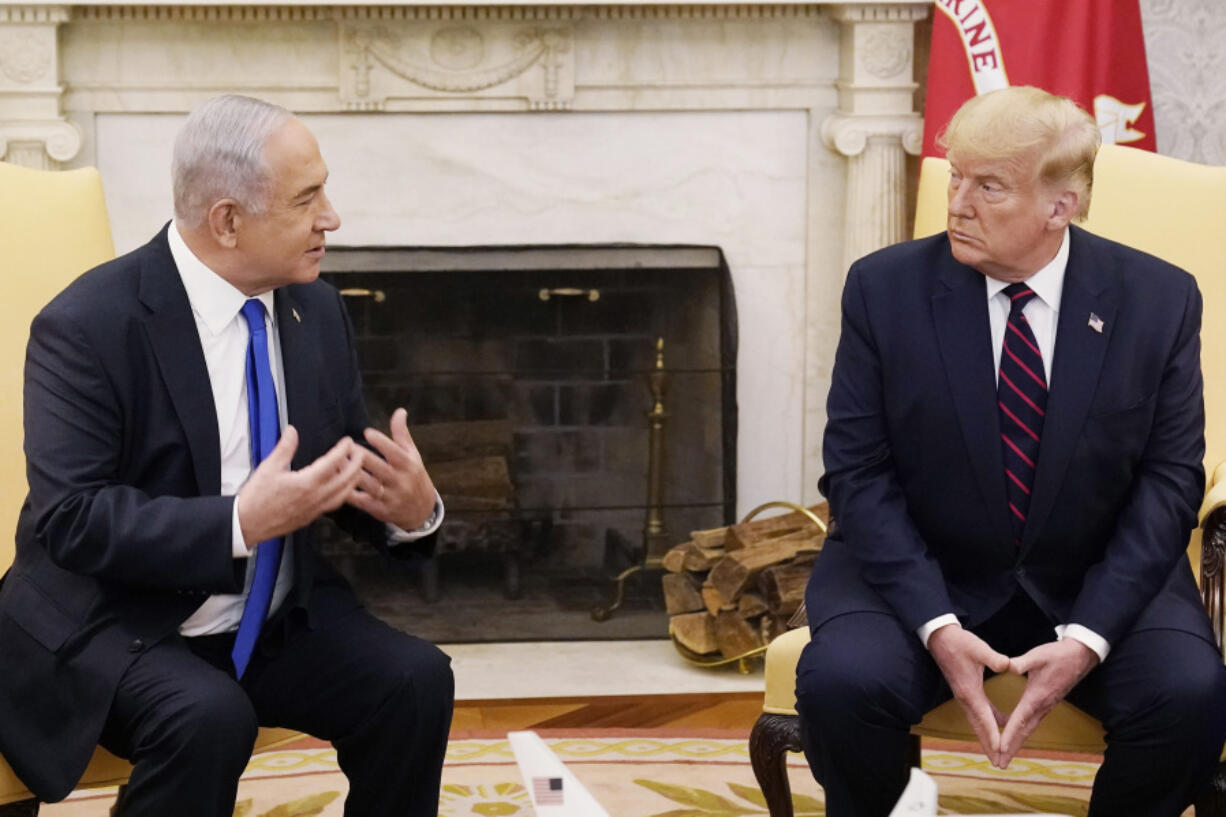 FILE - President Donald Trump, right, meets with Israeli Prime Minister Benjamin Netanyahu in the Oval Office, Sept. 15, 2020, at the White House in Washington. Trump is due to talk face-to-face with Netanyahu for the first time in nearly four years. The meeting Friday, July 26, 2024, at Mar-a-Lago will mend a break that has lasted since 2021. Trump at the time blasted Netanyahu for being one of the first leaders to congratulate President Joe Biden for his election victory.