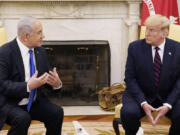 FILE - President Donald Trump, right, meets with Israeli Prime Minister Benjamin Netanyahu in the Oval Office, Sept. 15, 2020, at the White House in Washington. Trump is due to talk face-to-face with Netanyahu for the first time in nearly four years. The meeting Friday, July 26, 2024, at Mar-a-Lago will mend a break that has lasted since 2021. Trump at the time blasted Netanyahu for being one of the first leaders to congratulate President Joe Biden for his election victory.