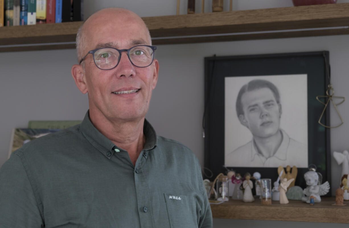 Thomas Schansman poses in front of a drawing of his son, Quinn, at his home in the central Dutch city of Hilversum, Netherlands, Thursday, July 11, 2024. Quinn Schansman dreamed of becoming the youngest ever CEO of an American company. But the 18-year-old dual Dutch-American citizen&rsquo;s future &mdash; whatever it may have held &mdash; was cruelly cut short when he was one of the 298 people killed as a Soviet-era Buk surface-to-air rocket launched from territory in eastern Ukraine controlled by pro-Russian rebels destroyed Malaysia Airlines Flight MH17.