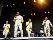 FILE - Roquel Payton, from left, Alexander Morris, Ronnie McNeir, and Duke Fakir of the Four Tops perform at the All In Music &amp; Arts Festival in Indianapolis on Sept. 3, 2022.