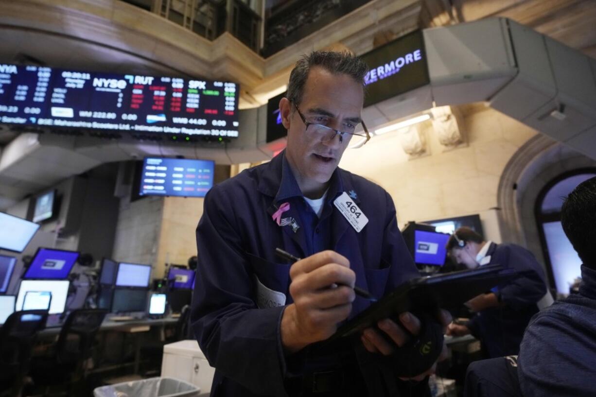 Trader Gregory Rowe works on the floor of the New York Stock Exchange, Monday, July 22, 2024.   After getting trounced by their larger rivals for years, some of the smallest stocks on Wall Street have shown much more life recently.