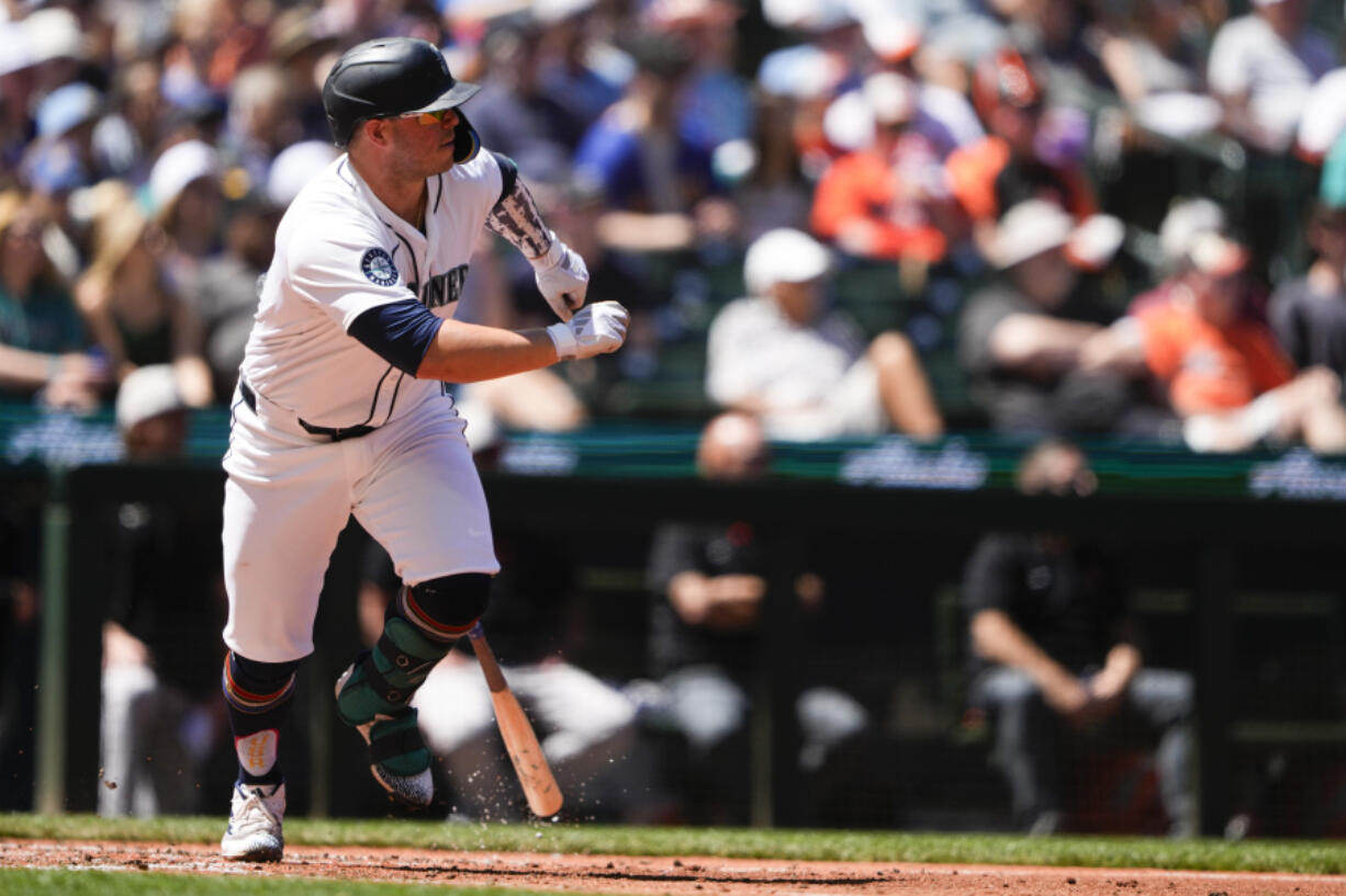 Seattle Mariners&#039; Ty France watches his single against the Baltimore Orioles during the fifth inning of a baseball game Thursday, July 4, 2024, in Seattle.