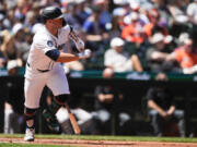 Seattle Mariners&#039; Ty France watches his single against the Baltimore Orioles during the fifth inning of a baseball game Thursday, July 4, 2024, in Seattle.