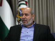 FILE - Khalil al-Hayya, a high-ranking Hamas official who has represented the Palestinian militant group in negotiations for a cease-fire and hostage exchange deal, speaks during an interview with The Associated Press, in Istanbul, Turkey, on April 24, 2024.