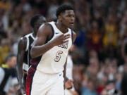 Anthony Edwards, of the United States, reacts after a three against South Sudan in a men&#039;s basketball game at the 2024 Summer Olympics, Wednesday, July 31, 2024, in Villeneuve-d&#039;Ascq, France. (AP Photo/Mark J.