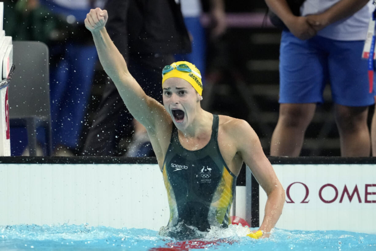 Kaylee McKeown, of Australia, celebrates after winning the women&rsquo;s 100-meter backstroke final at the 2024 Summer Olympics, Tuesday, July 30, 2024, in Nanterre, France.