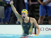 Kaylee McKeown, of Australia, celebrates after winning the women&rsquo;s 100-meter backstroke final at the 2024 Summer Olympics, Tuesday, July 30, 2024, in Nanterre, France.