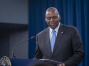 Secretary of Defense Lloyd Austin smiles while answering a question during a press briefing at the Pentagon on Thursday, July 25, 2024 in Washington.