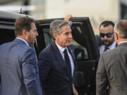 U.S. Secretary of State Antony Blinken exits a vehicle as he prepares for departure from the Ninoy Aquino International Airport in Pasay, a suburb of Manila, Philippines, Tuesday, July 30, 2024.