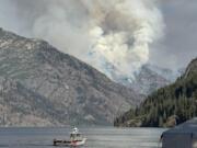 The pioneer fire has grown to more than 13,000 acres on the northeast bank of Lake Chelan.