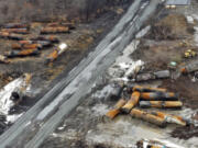 FILE - This image taken with a drone shows the continuing cleanup of portions of a Norfolk Southern freight train on Feb. 9, 2023, that derailed in East Palestine, Ohio. Amit Bose, the head of the Federal Railroad Administration, plans to testify at a House hearing Tuesday, July 23, 2024, that railroad safety has stagnated over the last decade and more needs to be done. But it&rsquo;s not clear if Republicans will support any rail safety reforms even after the disastrous East Palestine derailment that prompted the hearing. (AP Photo/Gene J.