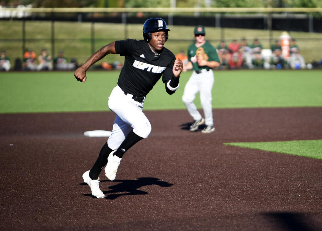 Ridgefield Raptors outfielder Dasan Harris runs to third base during a West Coast League baseball game against the Cowlitz Black Bears on Friday, July 5, 2024 at Ridgefield Outdoor Recreation Complex.