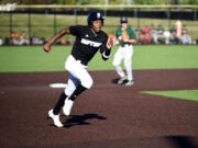 Ridgefield Raptors outfielder Dasan Harris runs to third base during a West Coast League baseball game against the Cowlitz Black Bears on Friday, July 5, 2024 at Ridgefield Outdoor Recreation Complex.