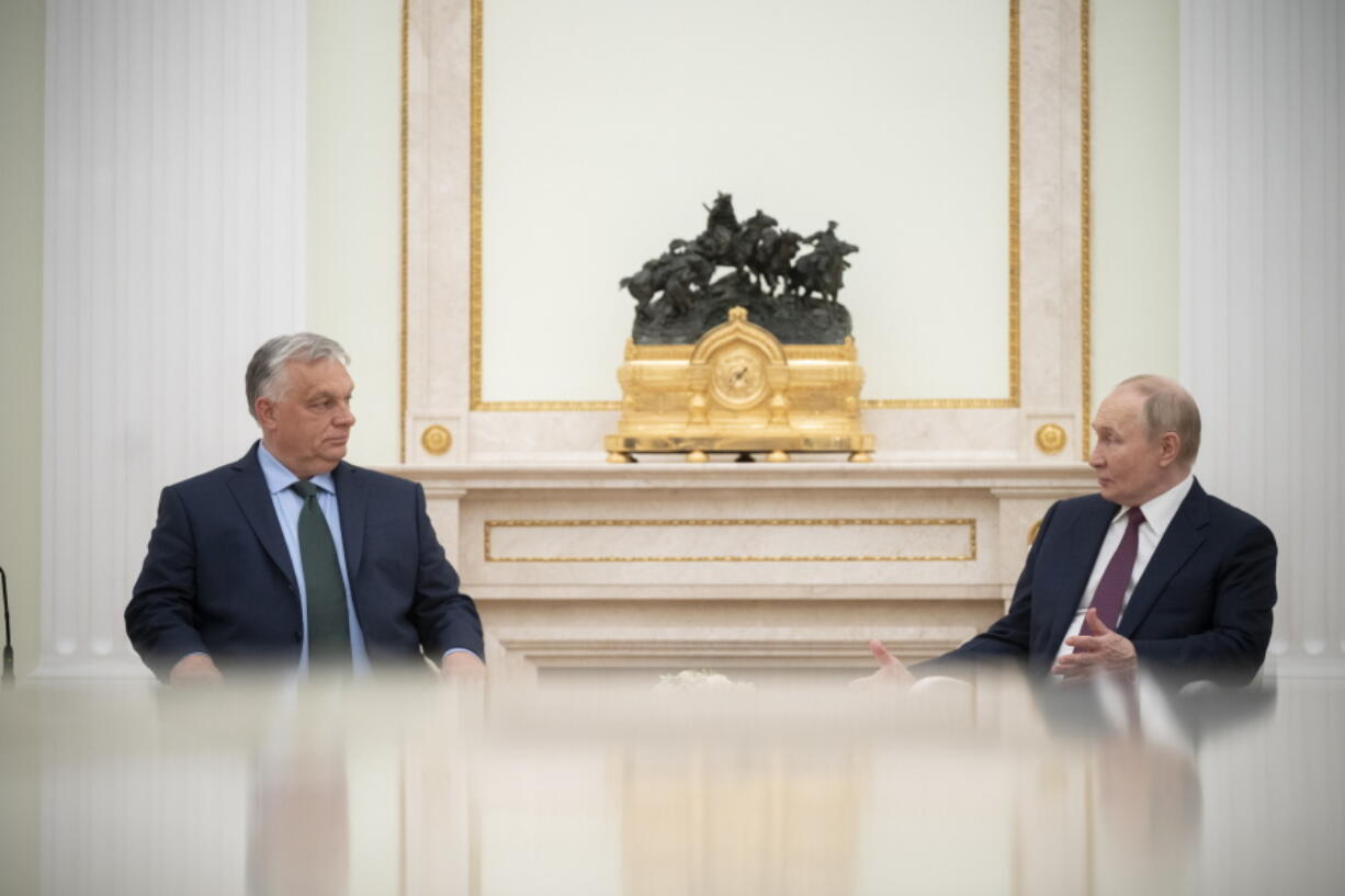 In this picture issued by the Hungarian PM&rsquo;s Press Office Russian President Vladimit Putin, right, and Hungarian Prime Minister Viktor Orban are seen during their meeting in the Kemlin in Moscow, Russia, Friday, July 5, 2024.