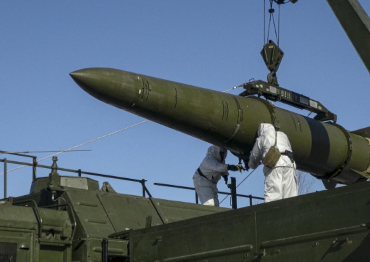 FILE - In this photo released by the Russian Defense Ministry Press Service on Feb. 2, 2024, Russian troops load an Iskander missile onto a mobile launcher during drills at an undisclosed location in Russia. Hawks in Russia have called for revising the country&rsquo;s nuclear doctrine to lower the threshold for using nuclear weapons, and President Vladimir Putin said the doctrine could be modified.