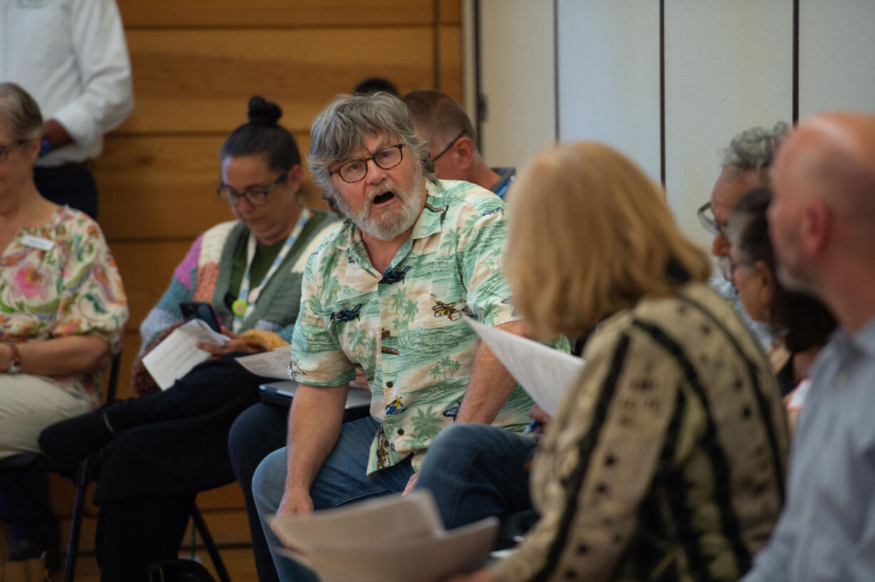 Steven Groat, a Vancouver resident concerned with proposed changes on Southeast McGillivray Boulevard, speaks at a Vancouver City Council forum at Vancouver&rsquo;s Firstenburg Community Center on June 24.