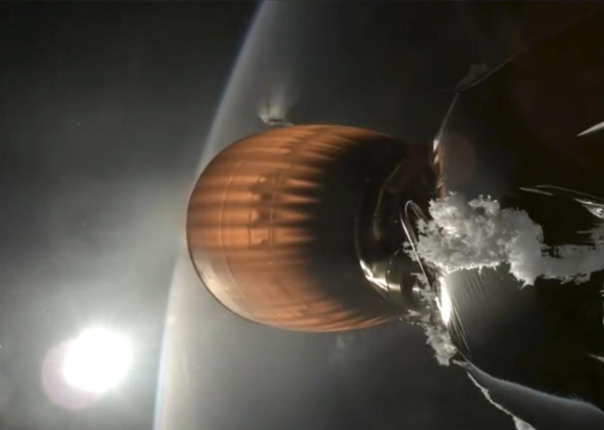 This image from video provided by SpaceX shows the upper stage engine of a SpaceX Falcon 9 rocket, which blasted off from California on Thursday, July 11, 2024. The rocket, carrying 20 Starlink satellites, malfunctioned during the blast, leaving the company&rsquo;s internet satellites in a precariously low orbit.