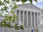 FILE - The Supreme Court building is seen on June 27, 2024, in Washington. Supreme Court justices will take the bench Monday, July 1, to release their last few opinions of the term, including their most closely watched case: whether former President Donald Trump has immunity from criminal prosecution.