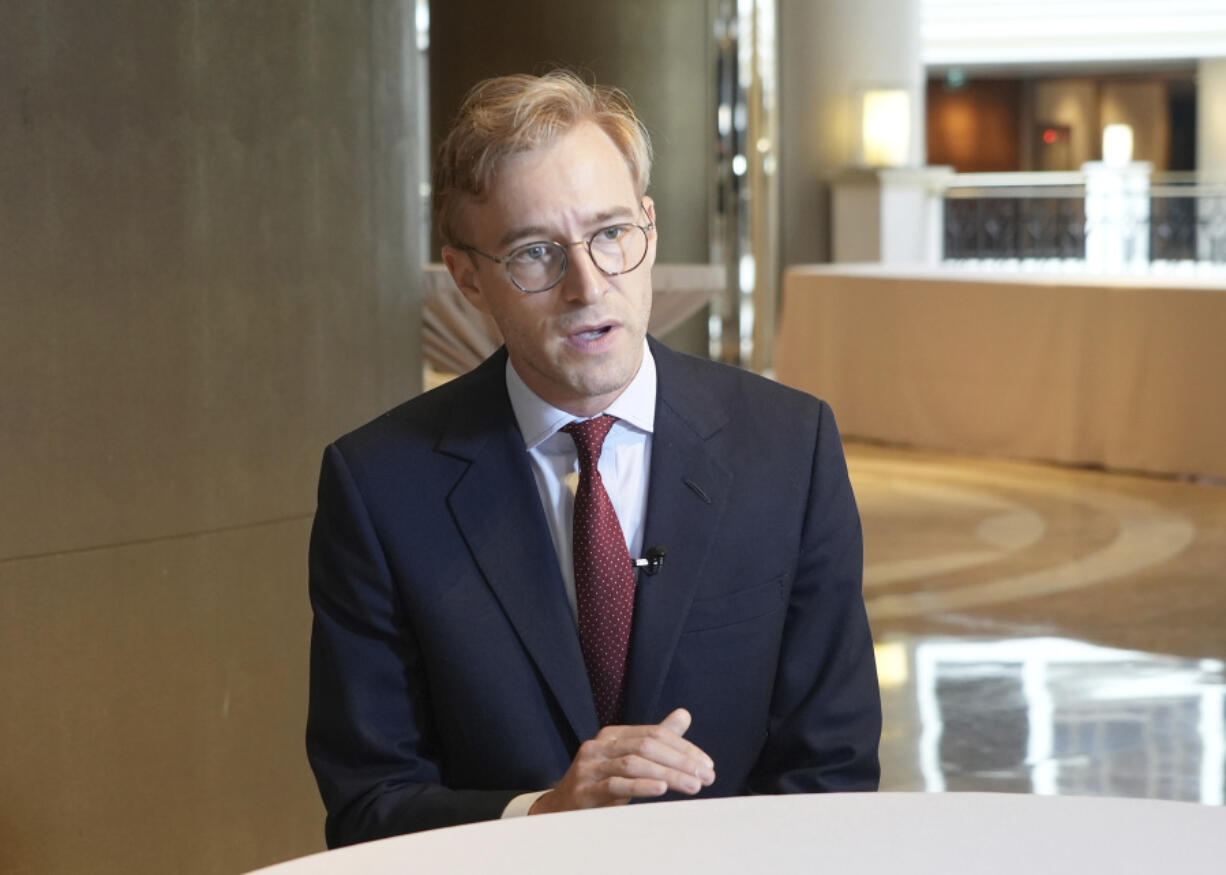 Luke de Pulford, Executive Director of the Inter-Parliamentary Alliance on China, speaks during an interview with The Associated Press in Taipei, Taiwan, Saturday, July 27, 2024.