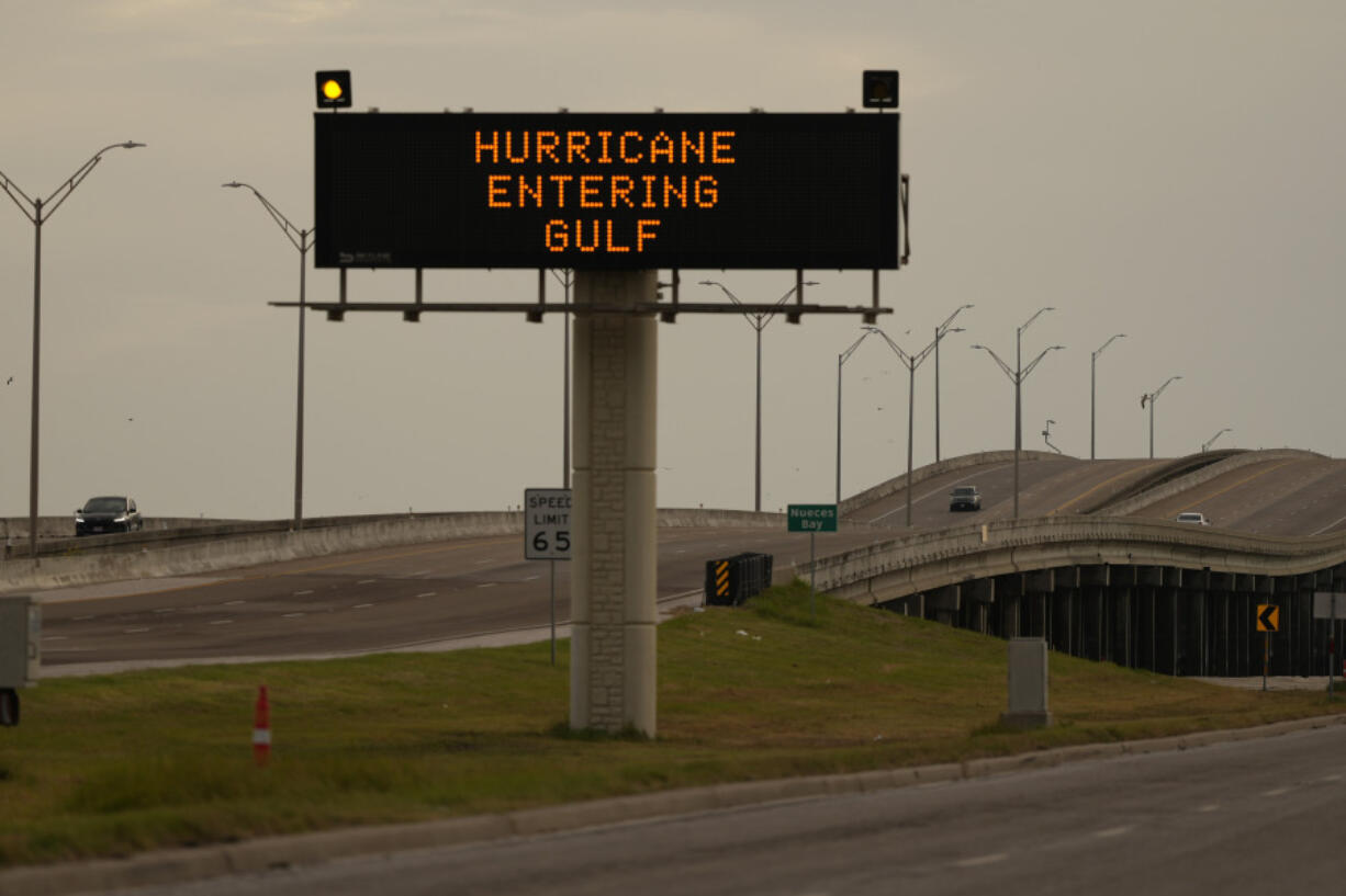 A sign notifies motorists to prepare for Hurricane Beryl, Sunday, July 7, 2024, in Portland, Texas.