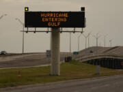 A sign notifies motorists to prepare for Hurricane Beryl, Sunday, July 7, 2024, in Portland, Texas.