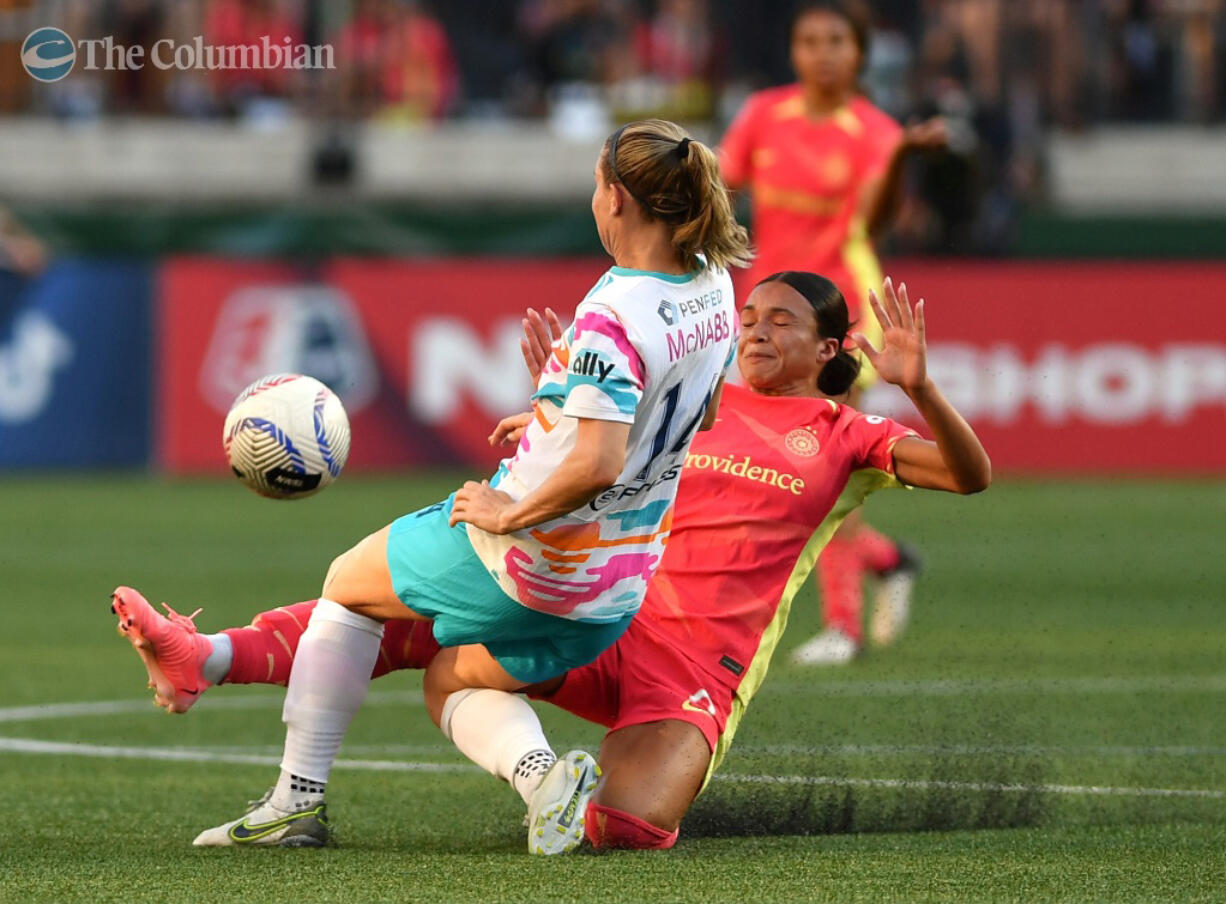 Portland Thorns forward Sophia Smith, right, and San Diego defender Kristen McNabb collide while going for the ball in the first half on Friday, July 5, 2024, at Providence Park in Portland.