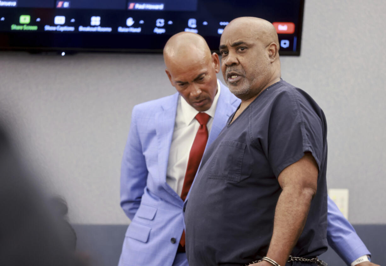 Duane &ldquo;Keffe D&rdquo; Davis, who is accused of orchestrating the 1996 slaying of hip-hop icon Tupac Shakur, right, talks to his attorney, Carl Arnold, in court at the Regional Justice Center in Las Vegas, Tuesday, June 25, 2024. (K.M.