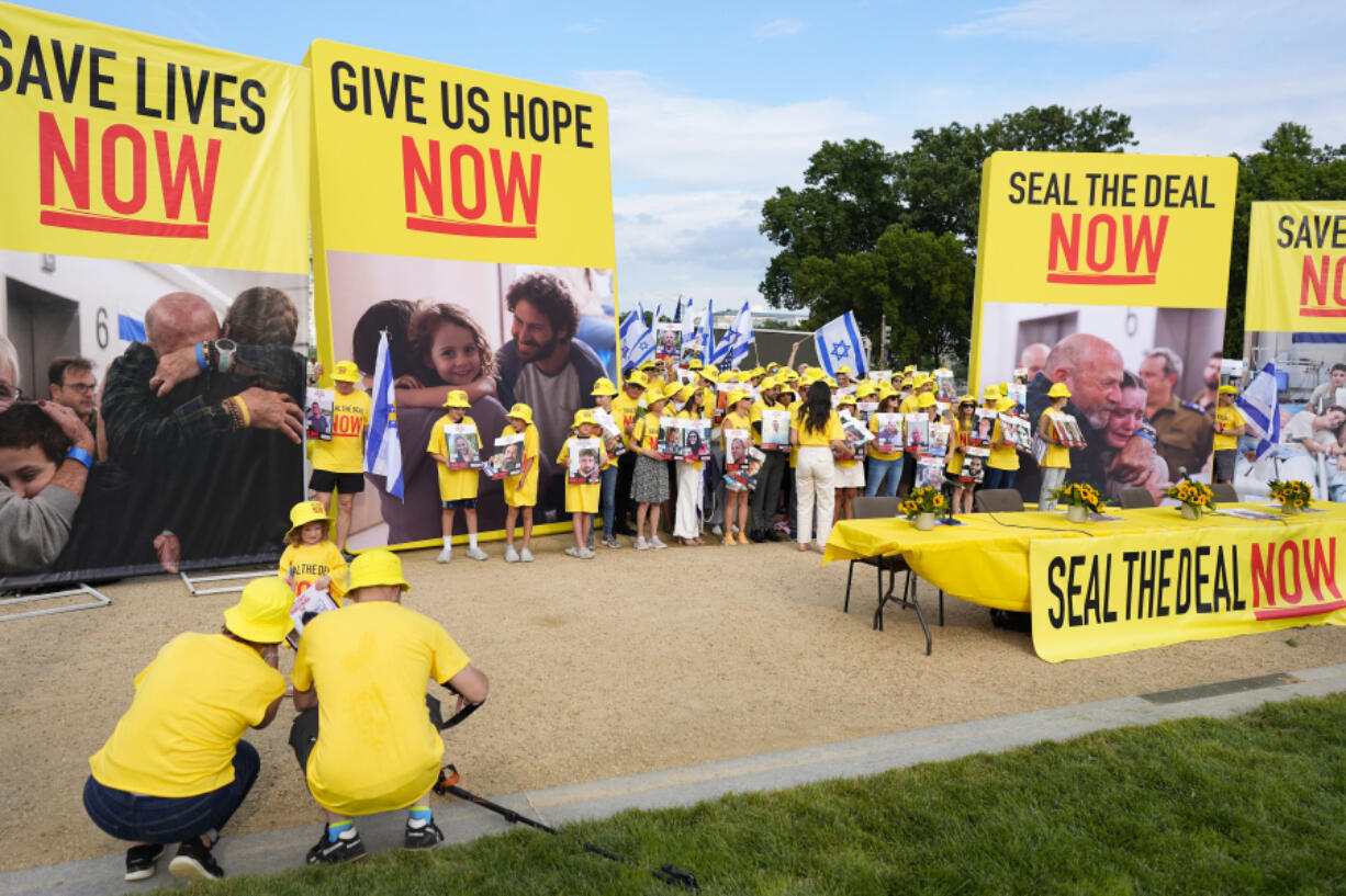 A group calling themselves Seal the Deal gathering during an event on the National Mall near the US Capitol on Tuesday, July 23, 2024, in Washington. A group of released hostages and family members of Israeli hostages held a press conference ahead of Israeli Prime Minister Benjamin Netanyahu&rsquo;s address to Congress on Wednesday.